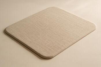 Linen desk pad with rounded edge