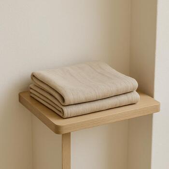 Soft cloth folded on a small shelf