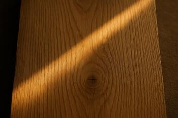 Oak plank with a thin line of sunlight