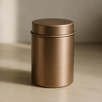 Brushed metal tea canister