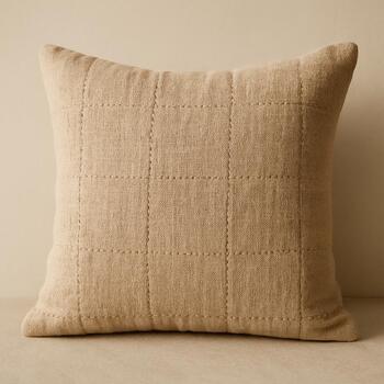 Textured cushion cover with subtle stitch pattern